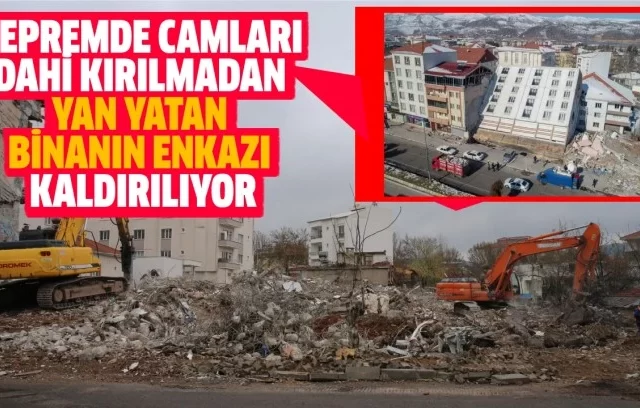 depremde camlari dahi kirilmadan yan yatan binanin enkazi kaldiriliyor 792077.webp